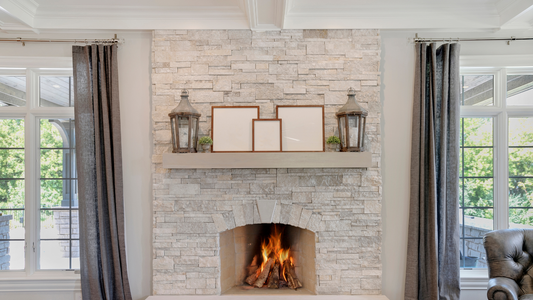 Modern fireplace with a clean stone facade, built-in firebox, and decorative accents—showcasing a hearth-free, updated living room design.