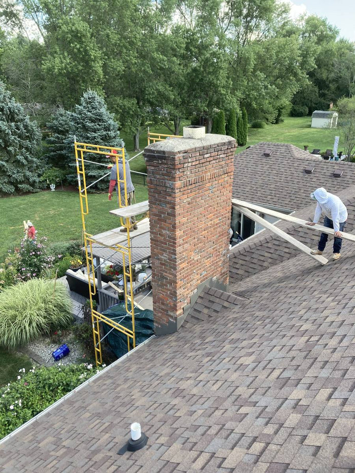 Detailed brick step and column repair work